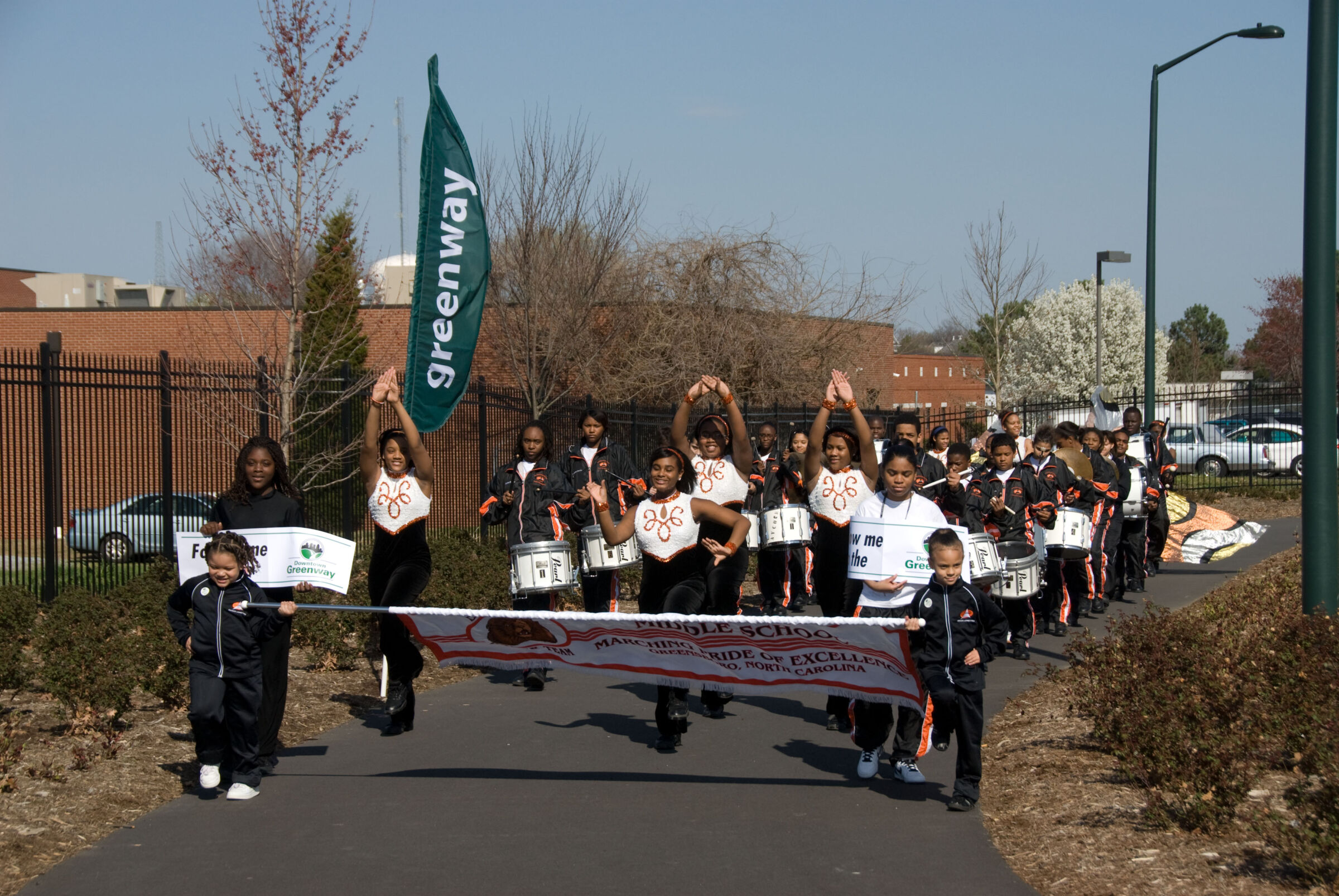 School band marching along Downtown Greenway in Greensboro, NC