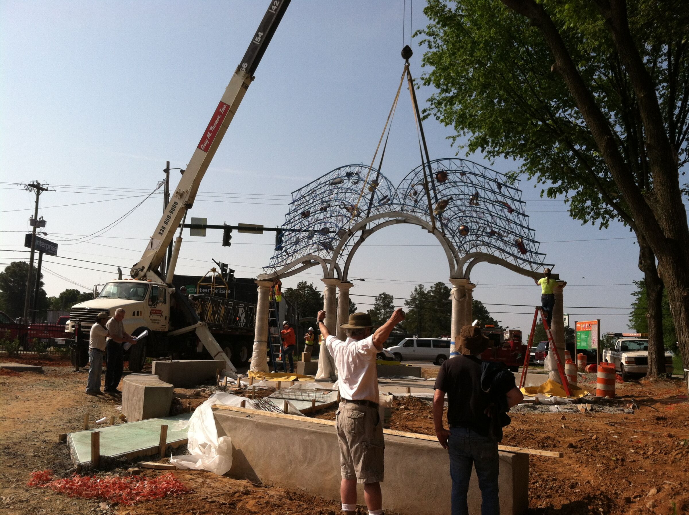 Construction on art installation at cornerstone of Downtown Greenway in 2012