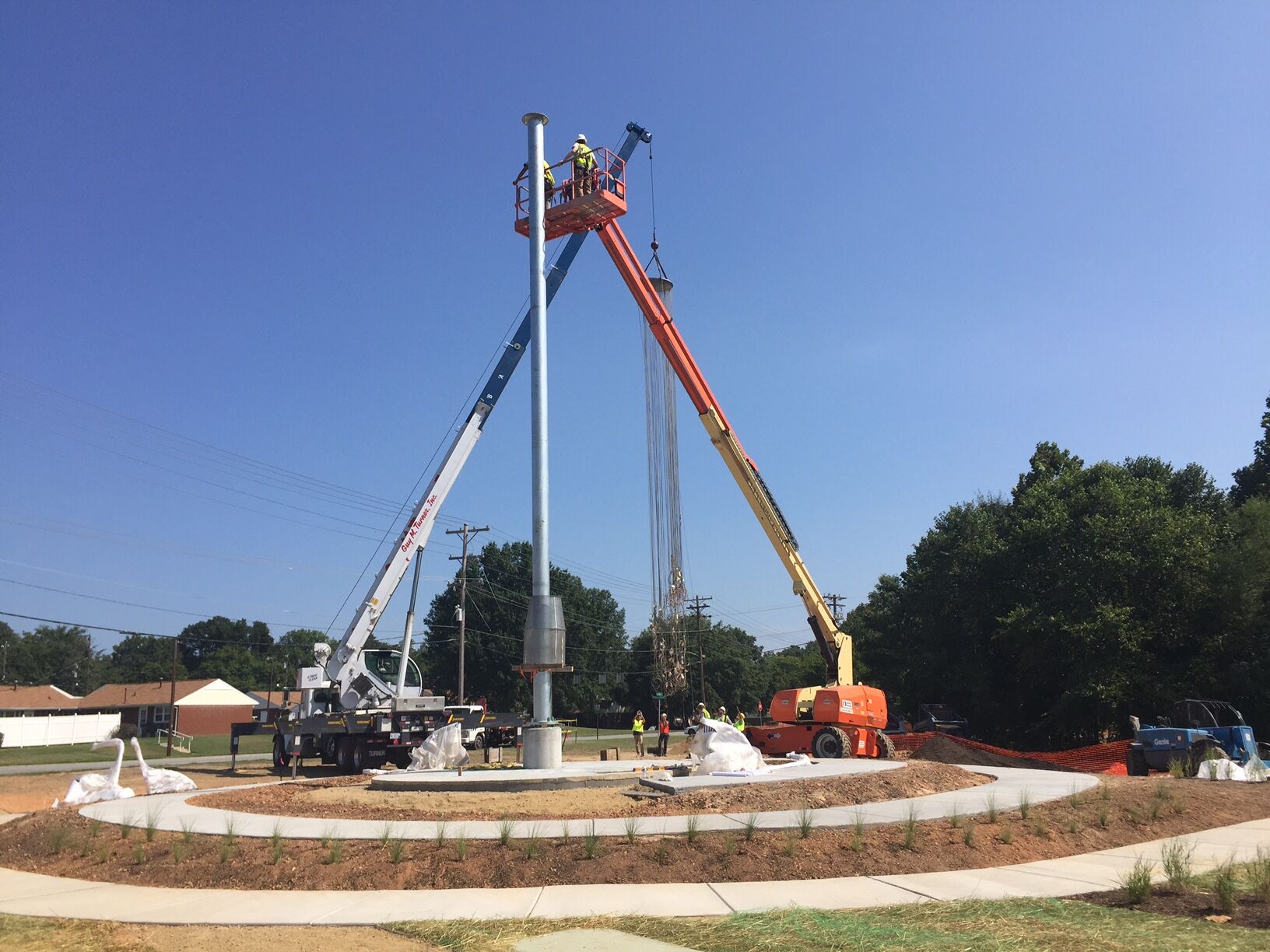 Construction of art installation along Downtown Greenway in Greensboro